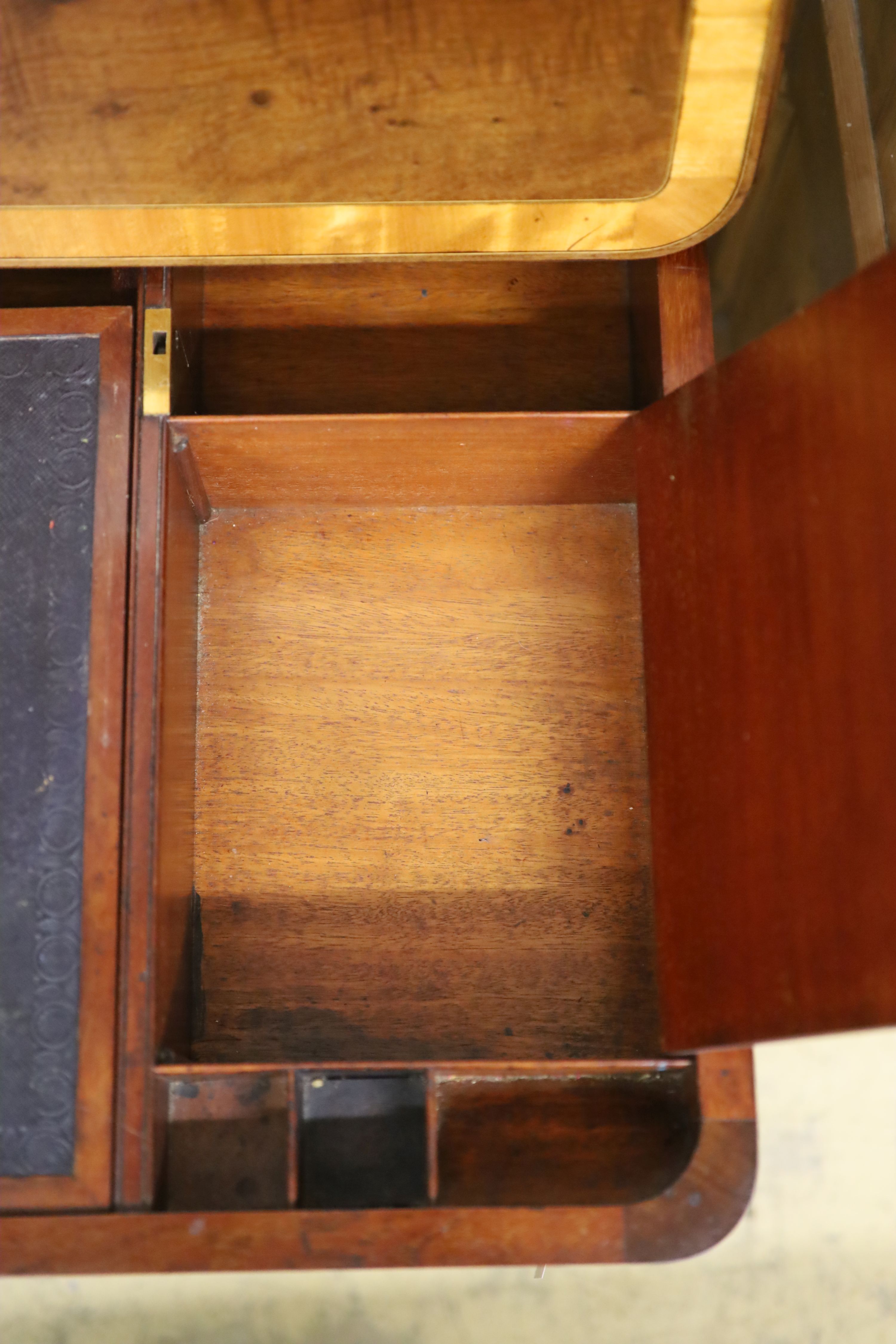 A Regency satin banded inlaid mahogany hinged top writing table, width 93cm depth 61cm height 75cm